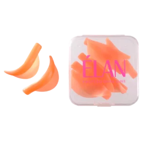 Soft orange ÉLAN lash lift shields shown with two samples and a full set inside a transparent case, ideal for creating precise lash curls during lamination